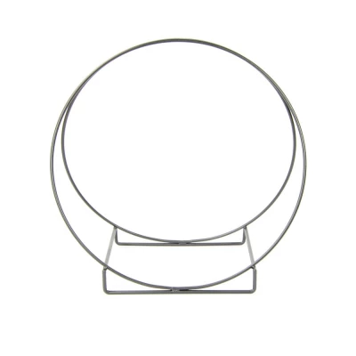 Sirkulær vedholder til peisen | Biopeiser-shop.no Vedholder i sirkel design