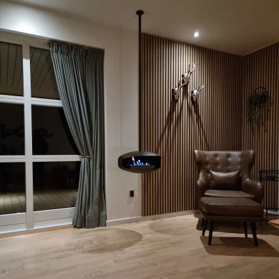 Stilren takhengt biopeis | Håndlaget | Hein & Haugaard Hein & Haugaard Oxid UFO-50 Takmontert Biopeis i stål med flott flamme