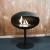 Svart Cocoon Pedestal fra Cocoon Fire med svart fot