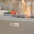 Roca biopeis i Space Grey – rund fiberbetongpeis med bronsefarget dekorglass og glassinnsats.